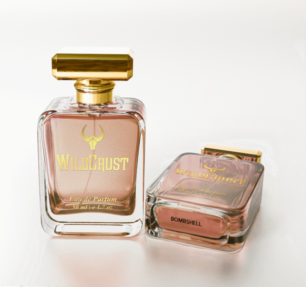 Victoria’s Secret Bombshell perfume bottle with pink hue, featuring fruity floral notes of passionfruit, peony, and musk.